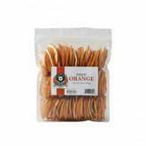 Packaged dried oranges with a label on a white background