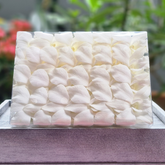 Fresh white Dendrobium orchids for cocktail garnishes and upscale drink presentations