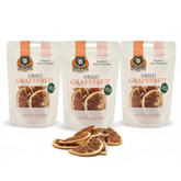 Three packages of dried grapefruit with slices on a white background