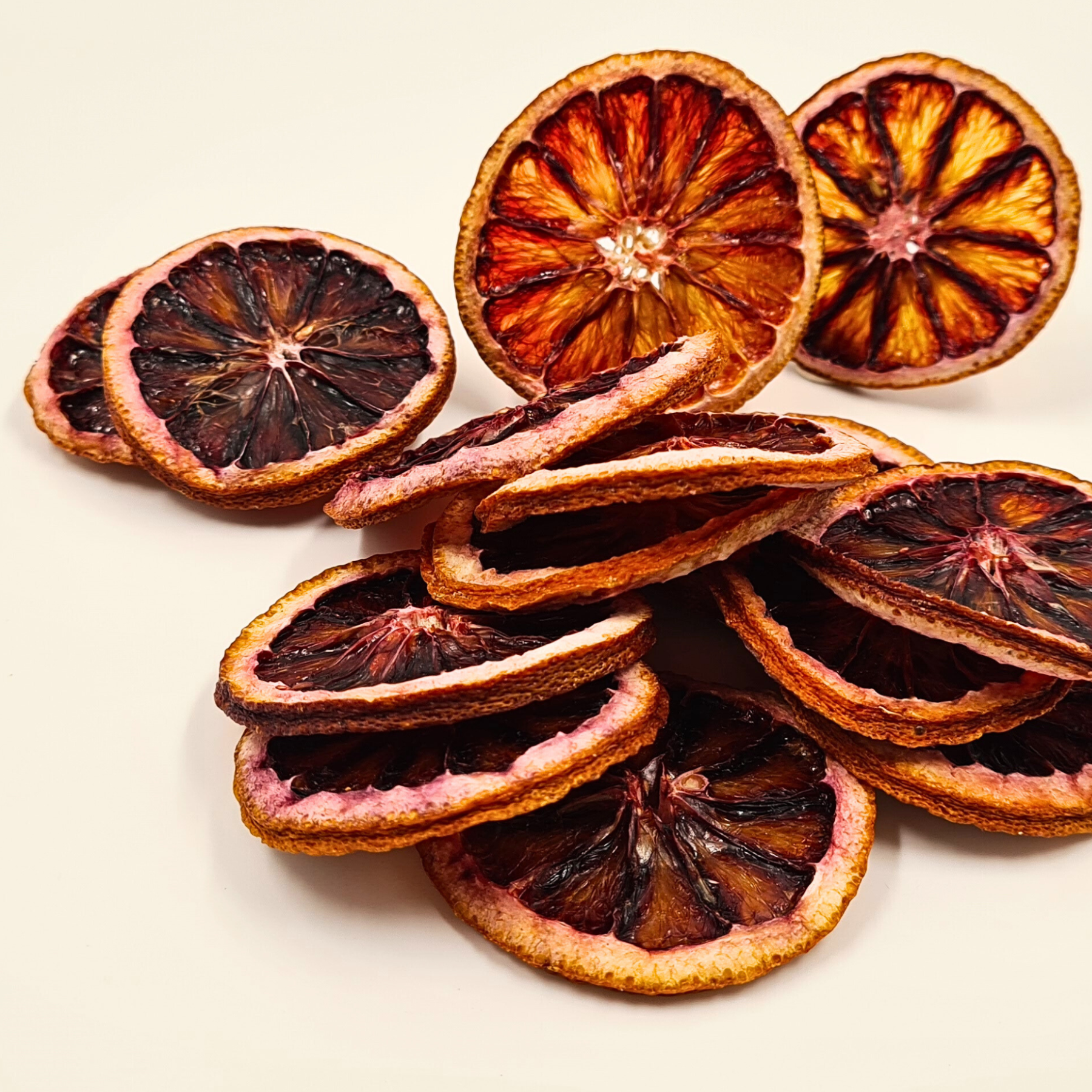 Bold ruby red blood orange slices, naturally dried for charcuterie boards, baking, and mixology