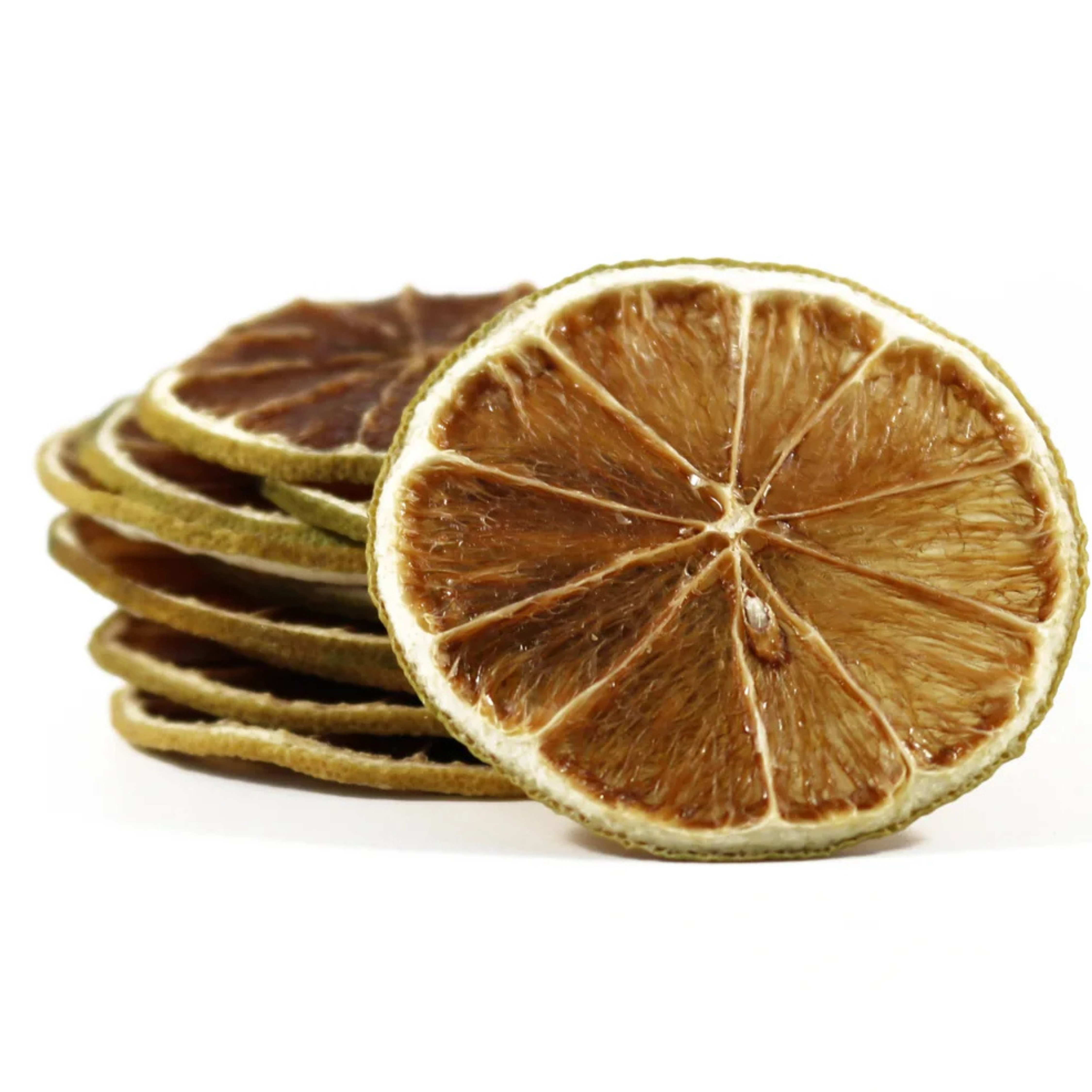 Stack of dried lime slices on a white background
