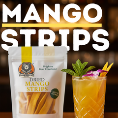 Packaged dried mango strips with a glass of mango juice on a wooden surface.